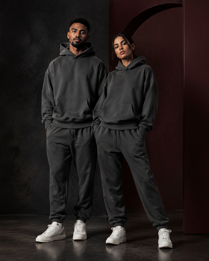 Couple's hooded sweatshirt and jogger set in a Tanzy editorial