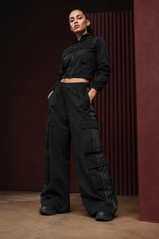 Women’s striped wide-leg cargo pants in a Tanzy streetwear editorial
